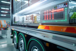 Futuristic food truck with digital display and green neon accents in modern warehouse