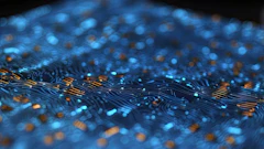 Abstract digital visualization with blue and orange particles flowing across circuit board patterns on dark background
